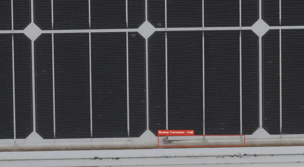 Busbar corrosion closeup showing dark degradation patterns