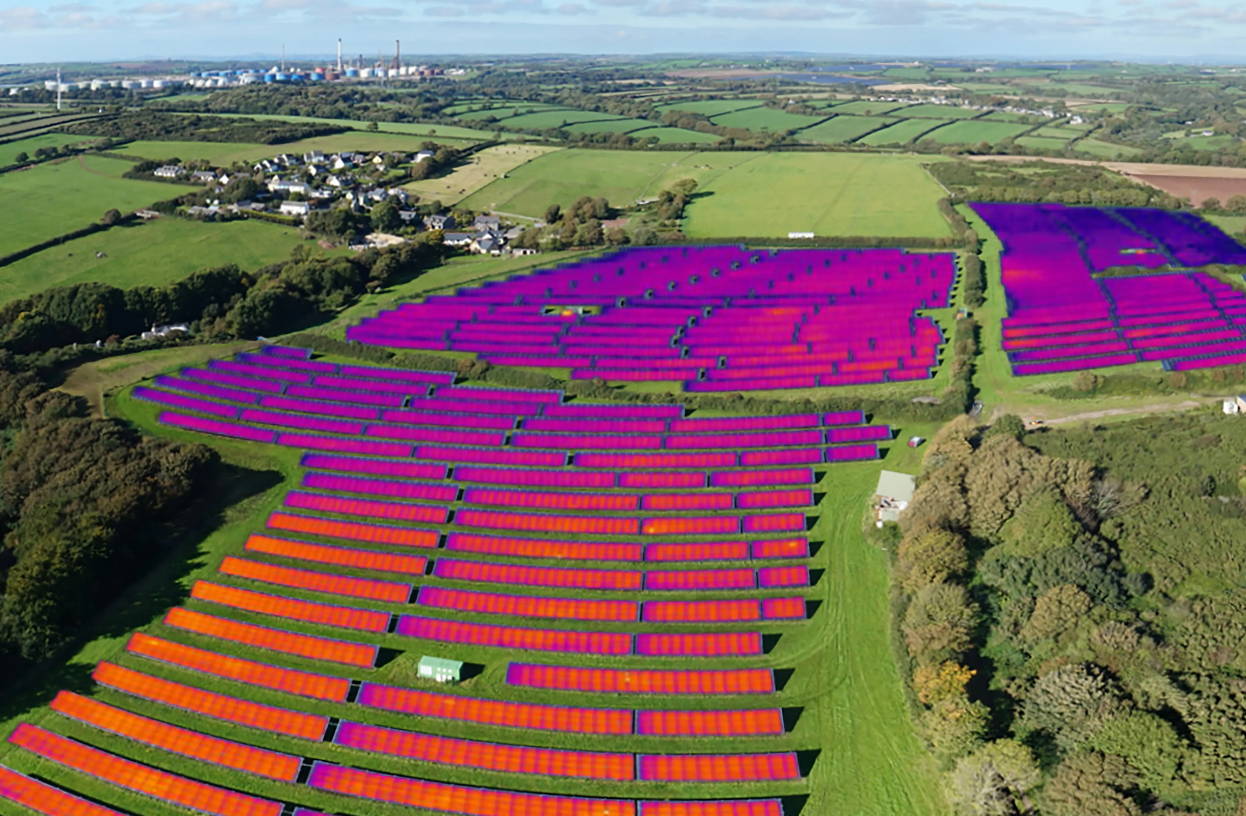 Thermal inspection overlay showing fault patterns on solar farm